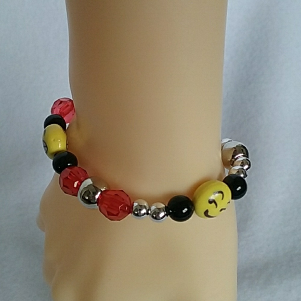 Yellow, red, & black emoji stretch bracelet